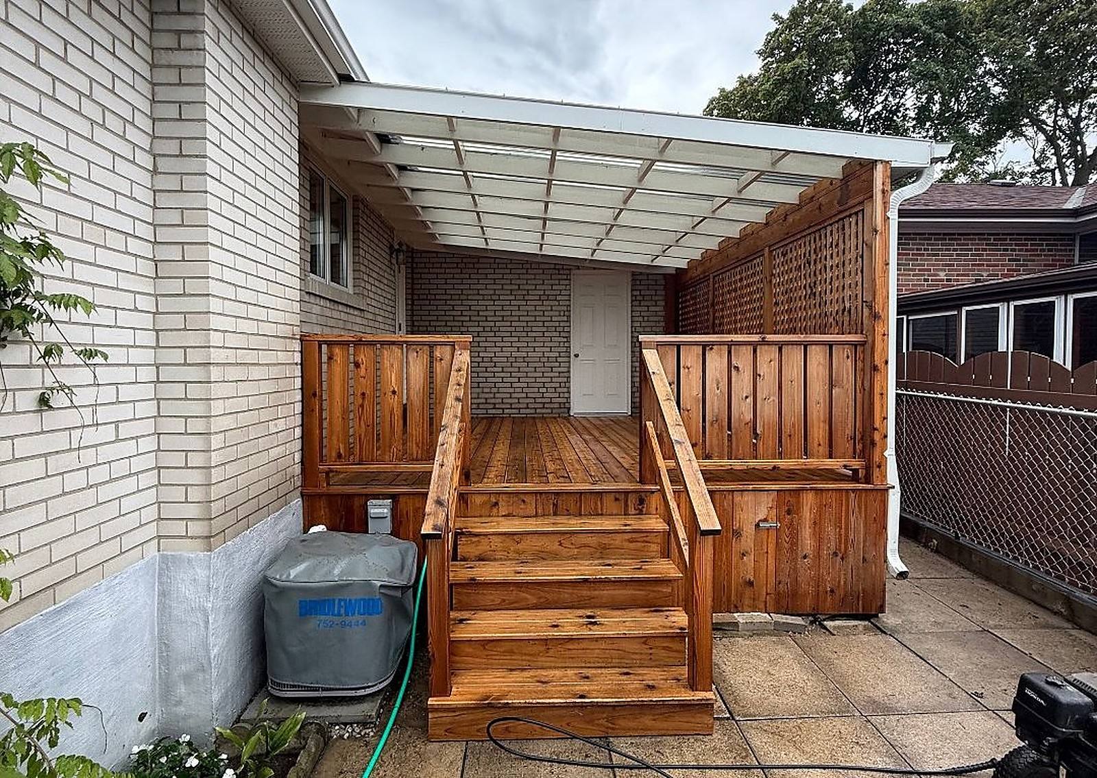 Restored cedar deck and stairs after sanding and staining