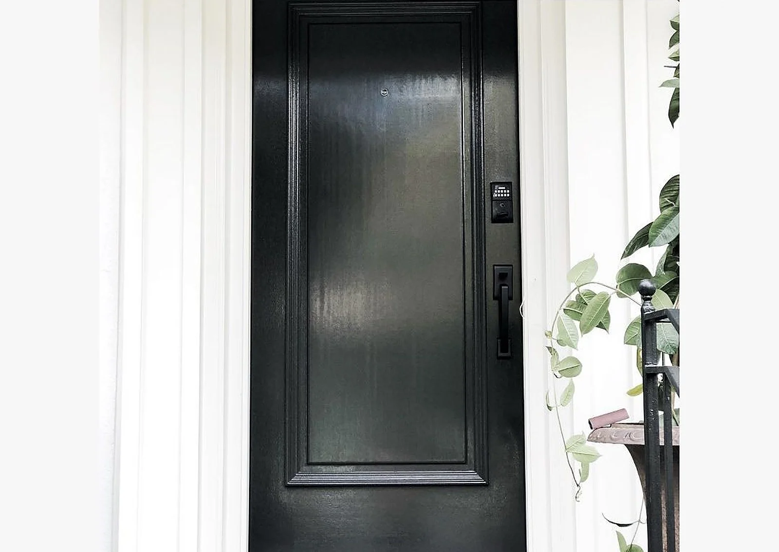 Glossy black front door