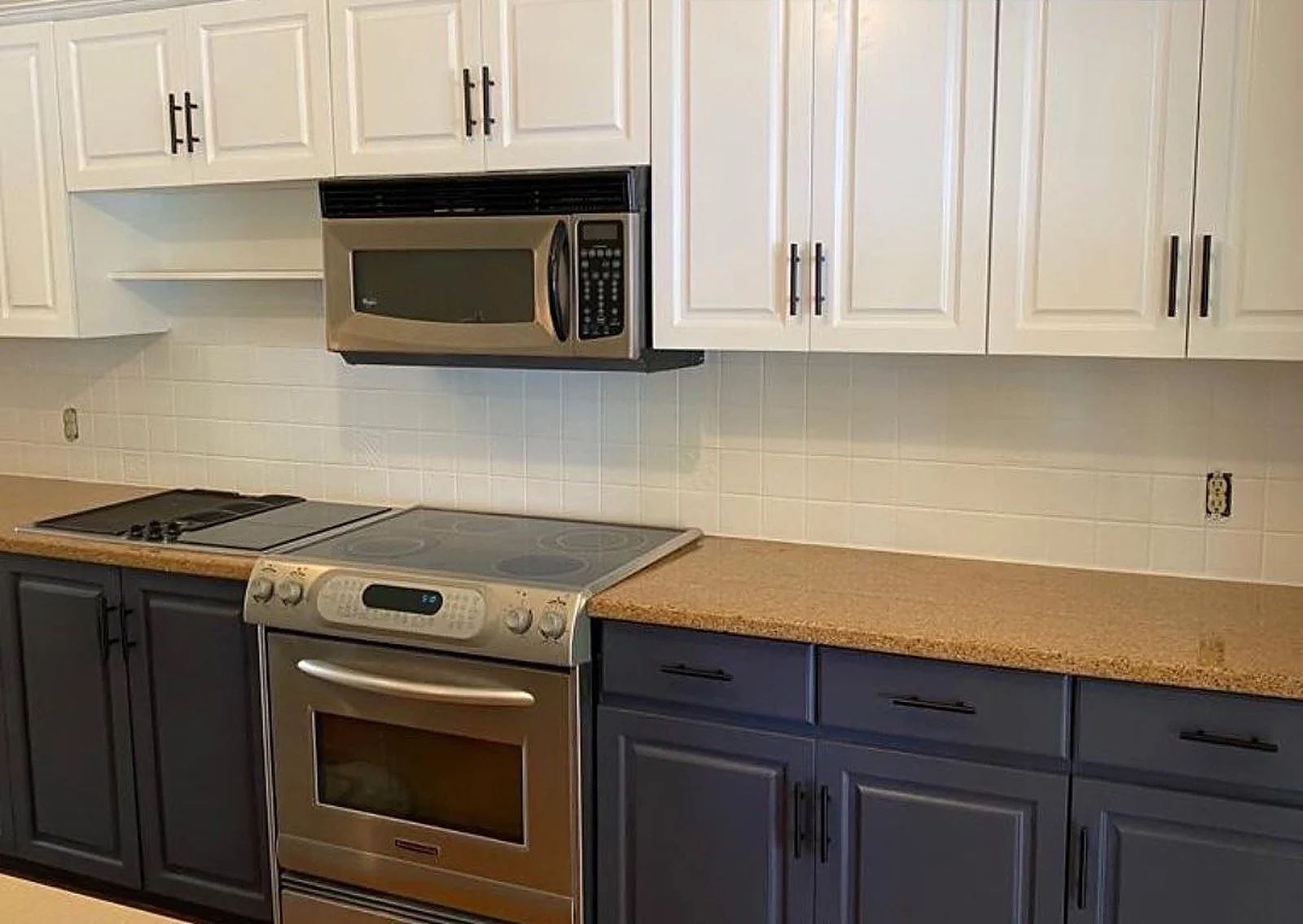 Navy and white kitchen cabinets