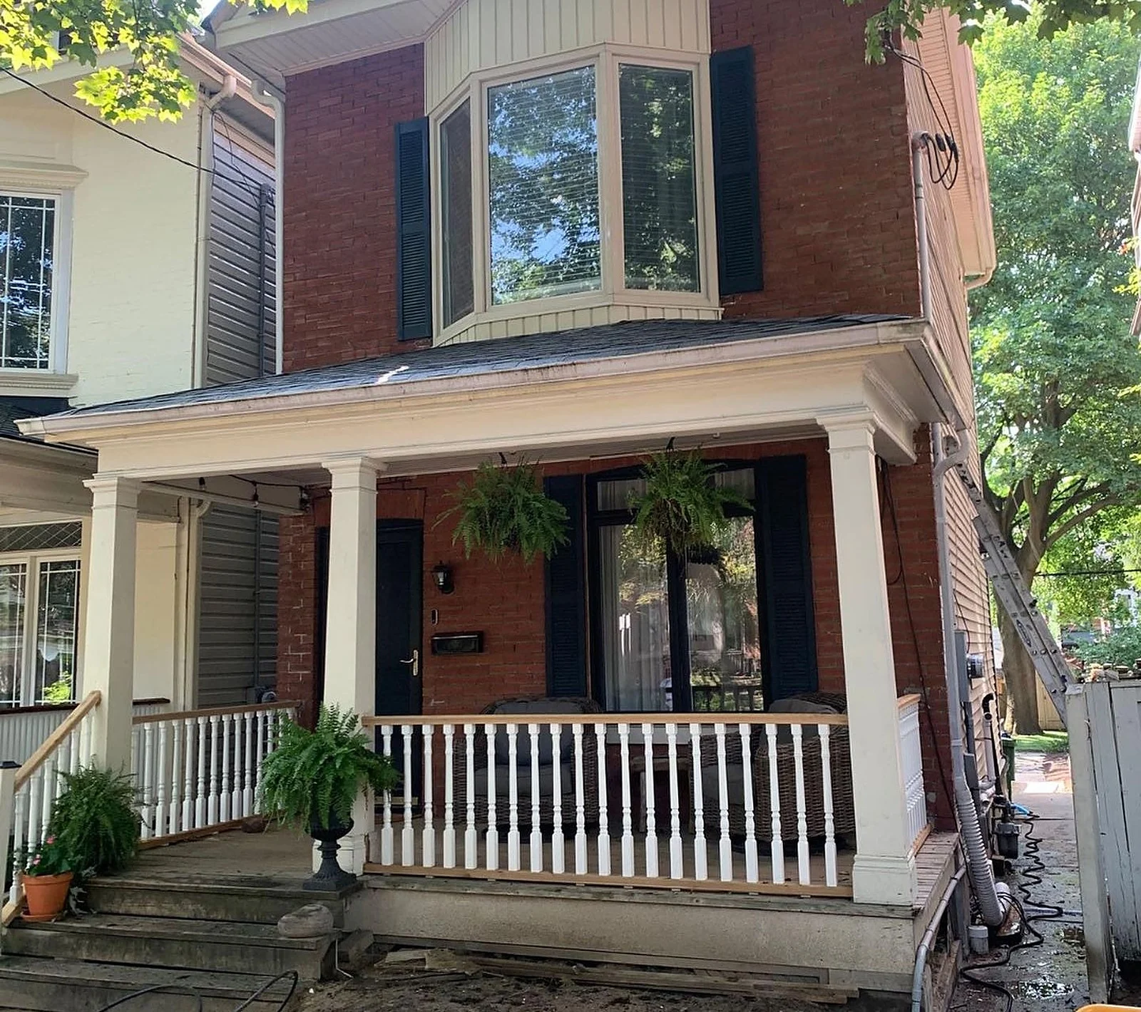 Before: From dull white to sleek black, porch