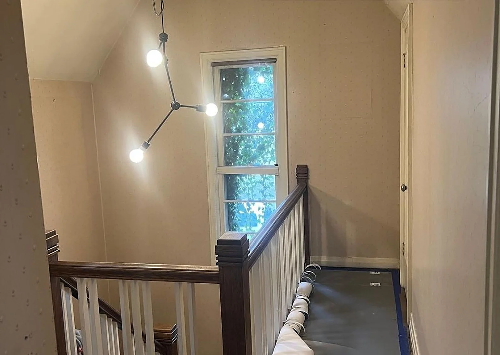Before: Stairwell, A stairwell, wallpaper gone