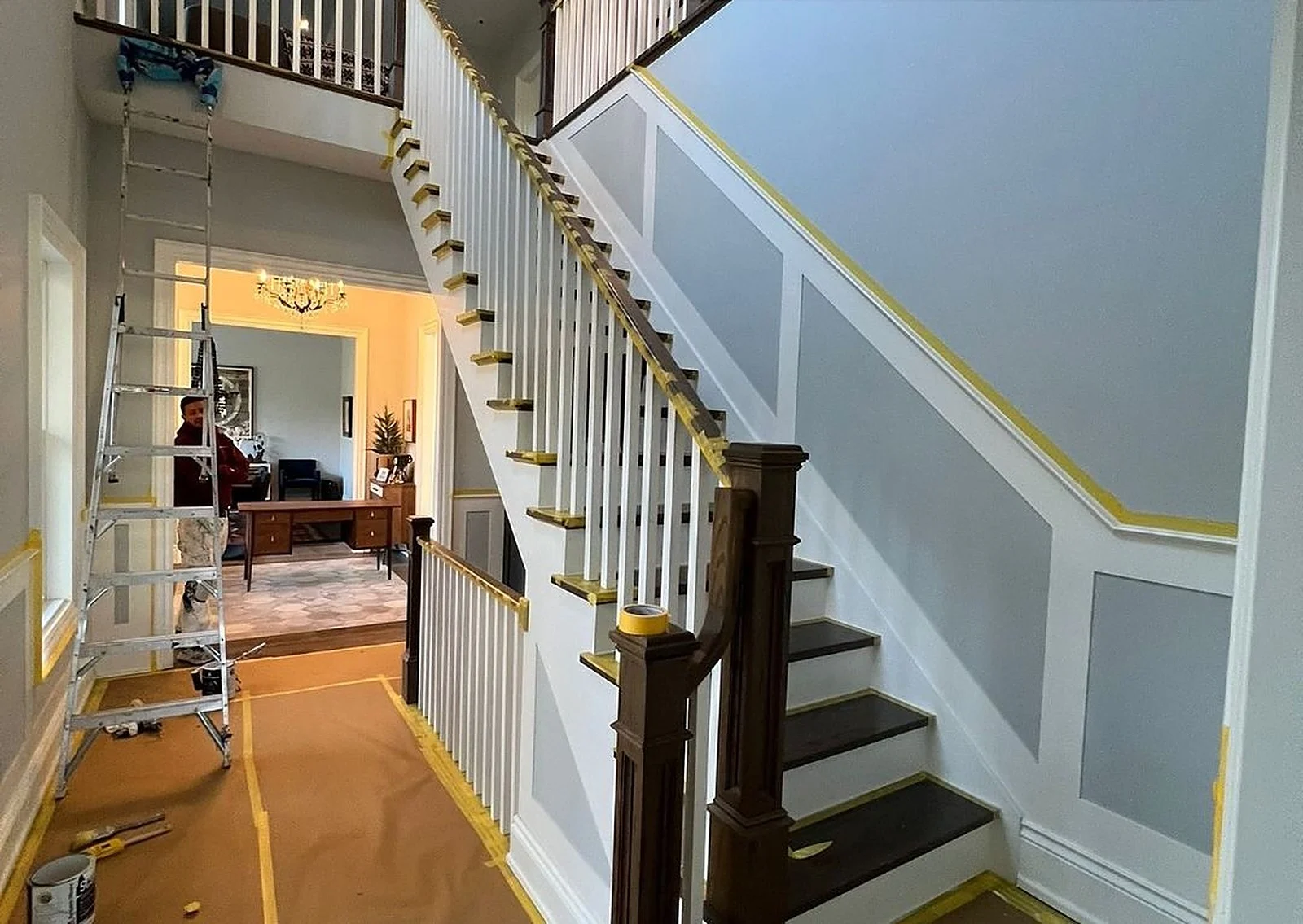Before: Staircase, A foyer staircase in deep navy