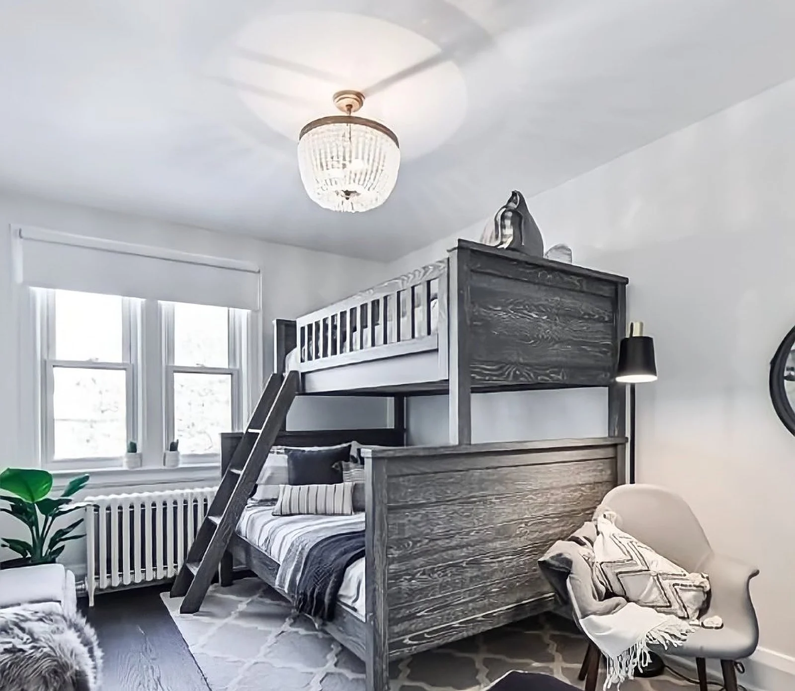 Midtown bedroom with bunk bed, white walls (MCF watermark)