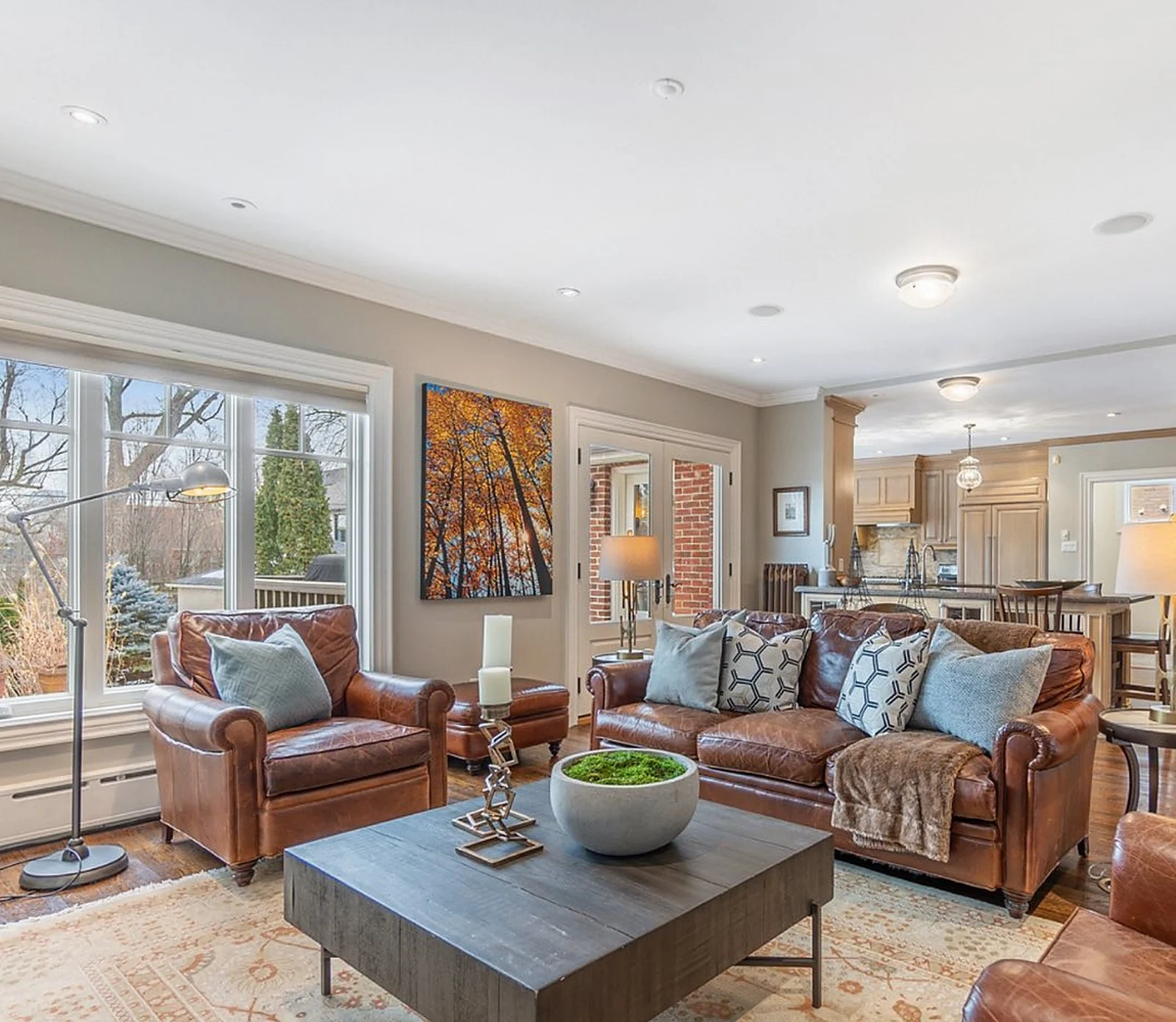 Lawrence Park family room, leather sofas, light walls (5500 sqft interior job)
