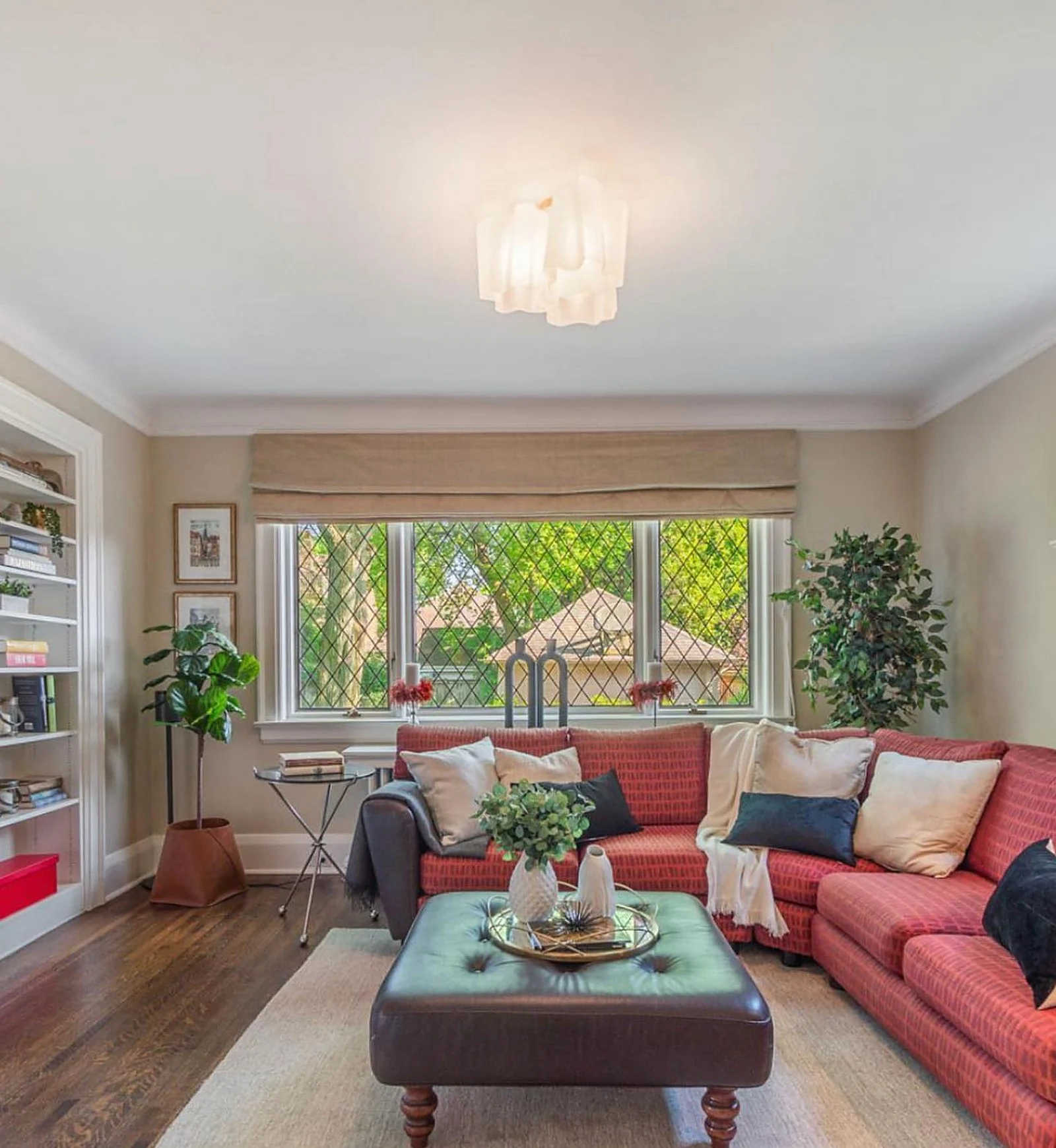Lytton Park living room with red sofa after painting
