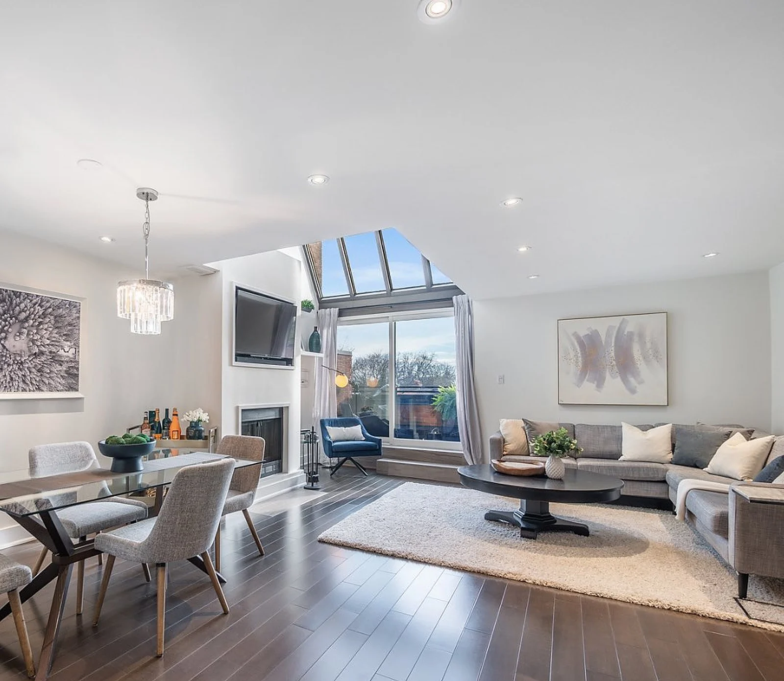 Summerhill penthouse living and dining room with skylights