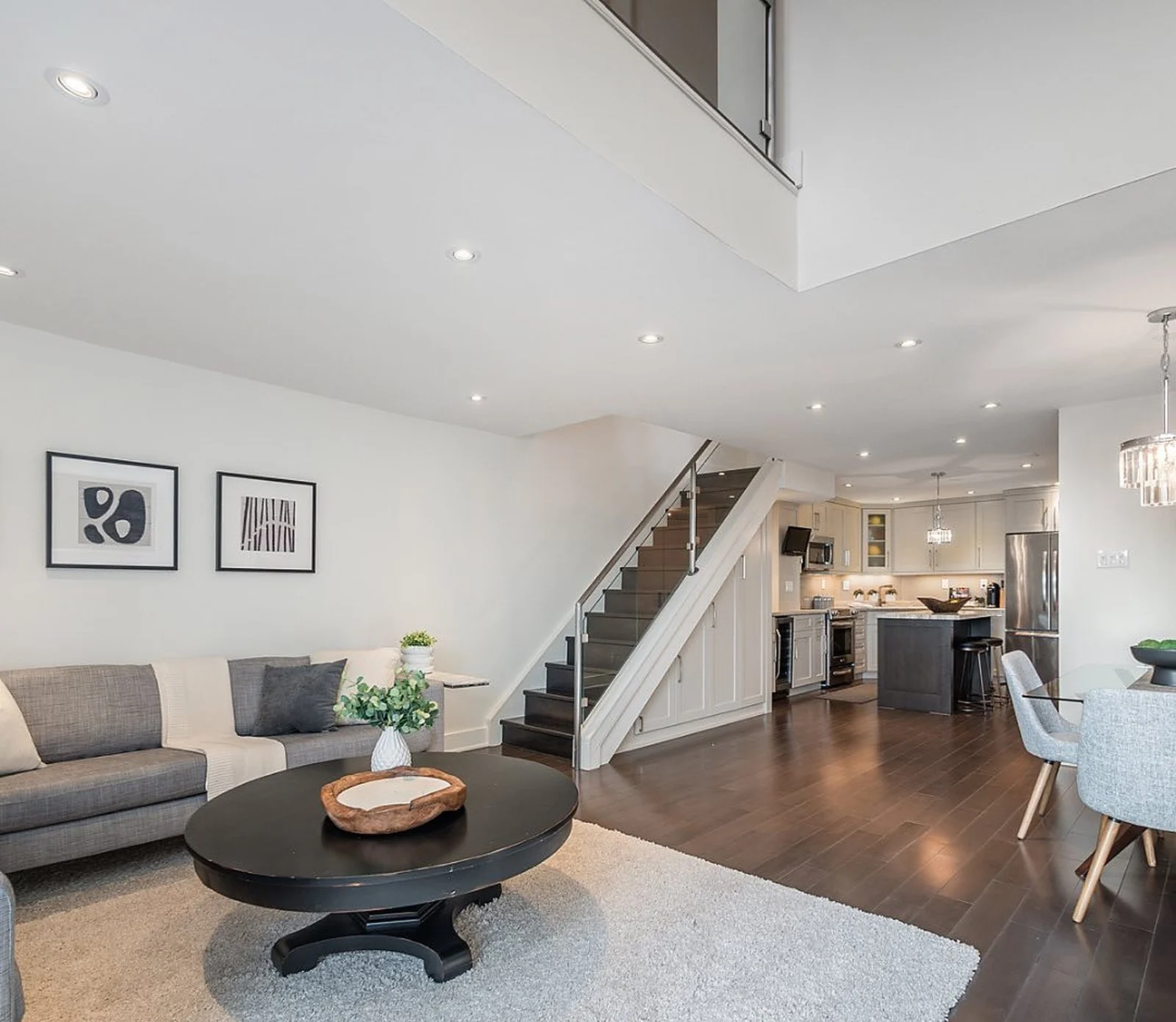 Penthouse living area and staircase, white