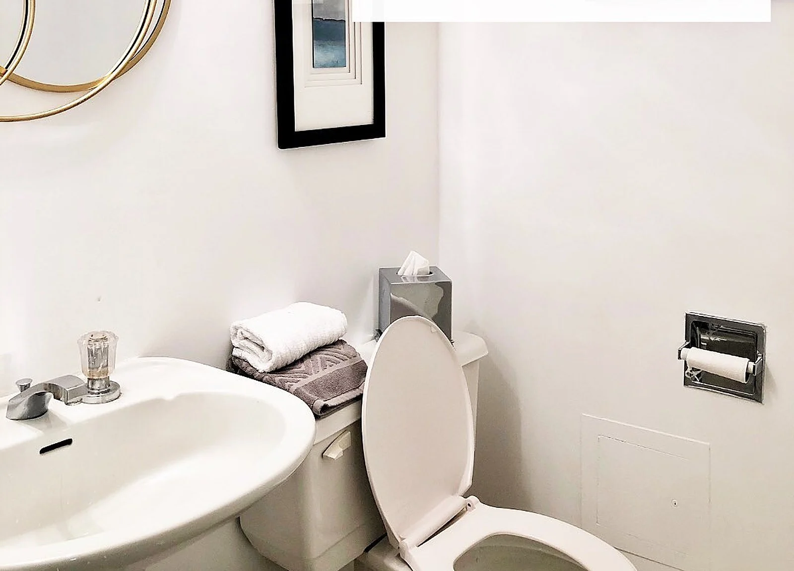 AFTER: same bathroom painted white