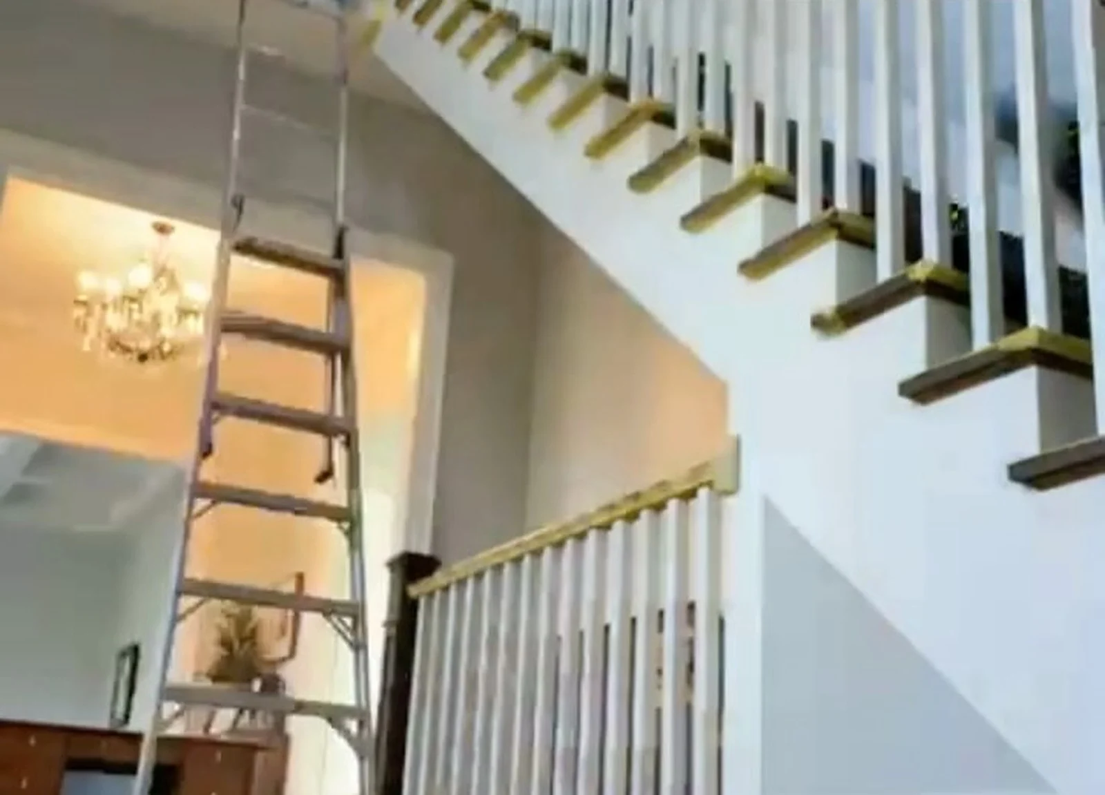 DURING: staircase with ladder, masking
