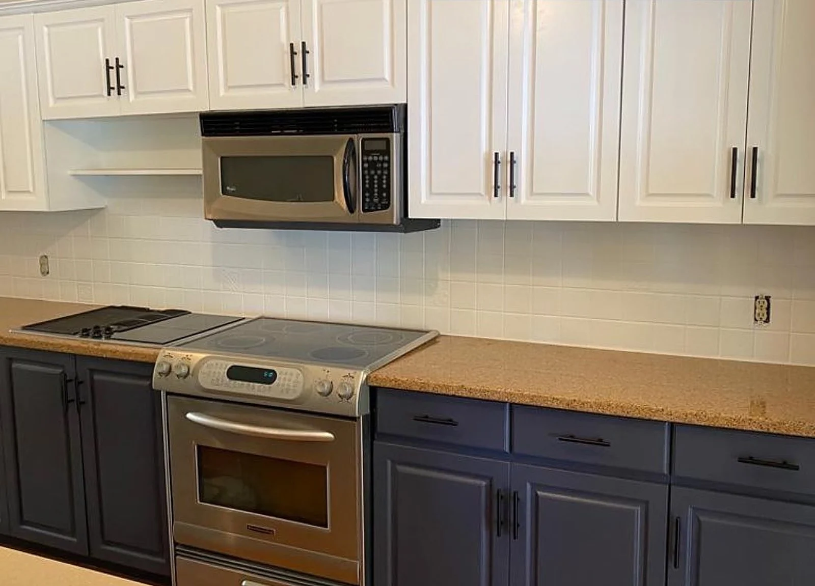 AFTER: cottage kitchen, white upper cabinets, navy lower cabinets
