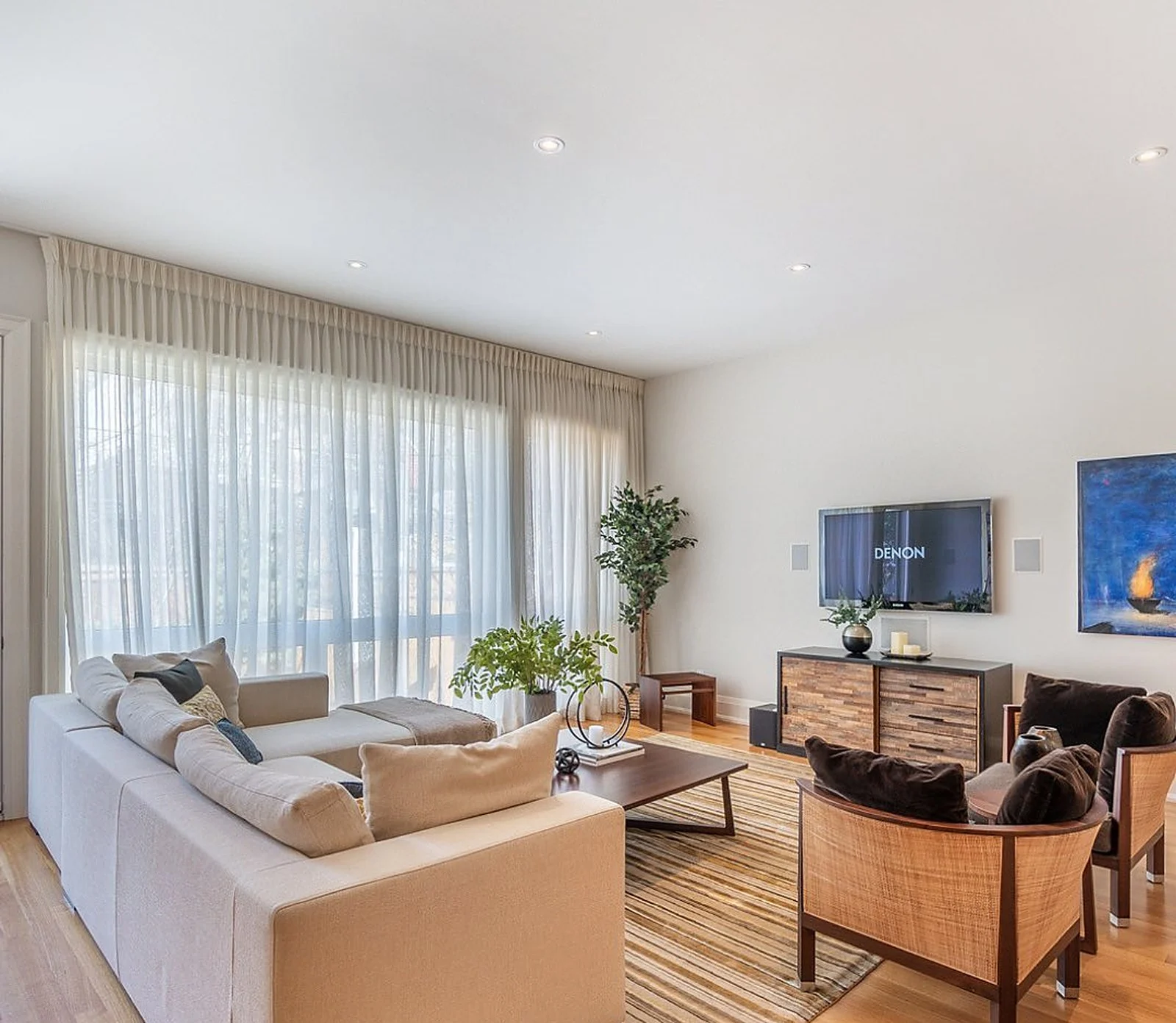 Bright Rosedale living room after painting, staged for the listing