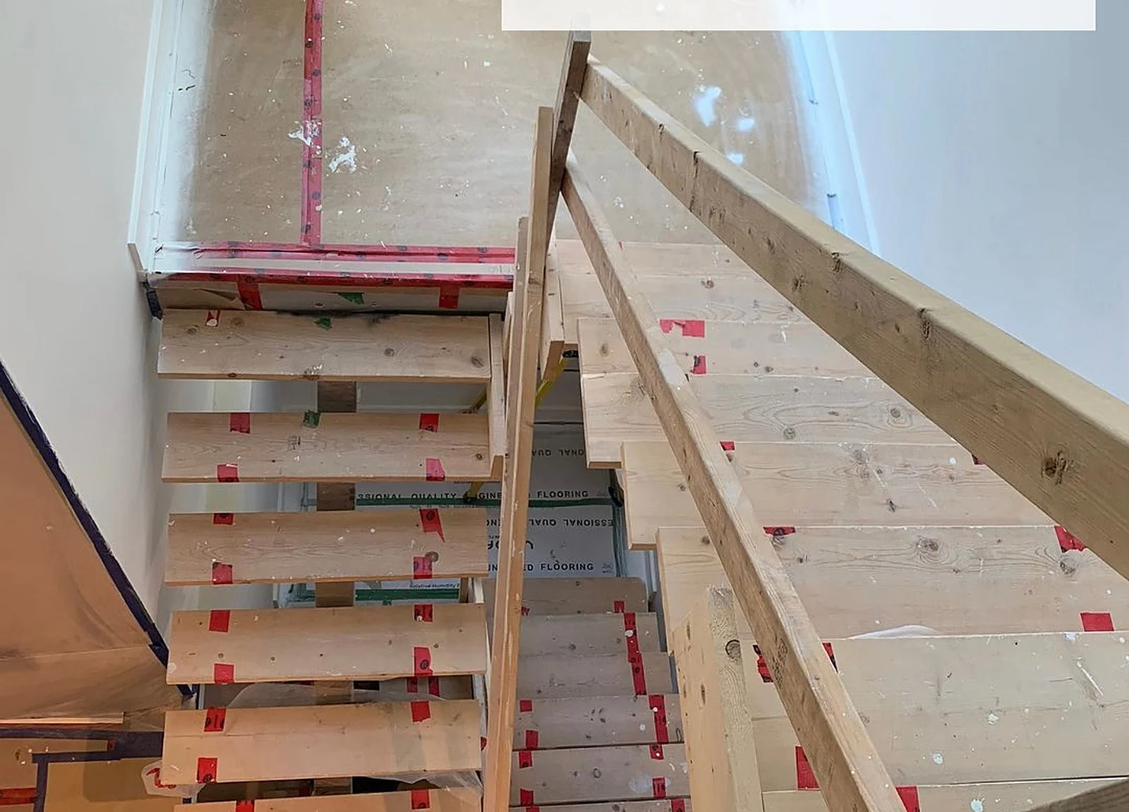 BEFORE: raw stair stringers/treads with protection