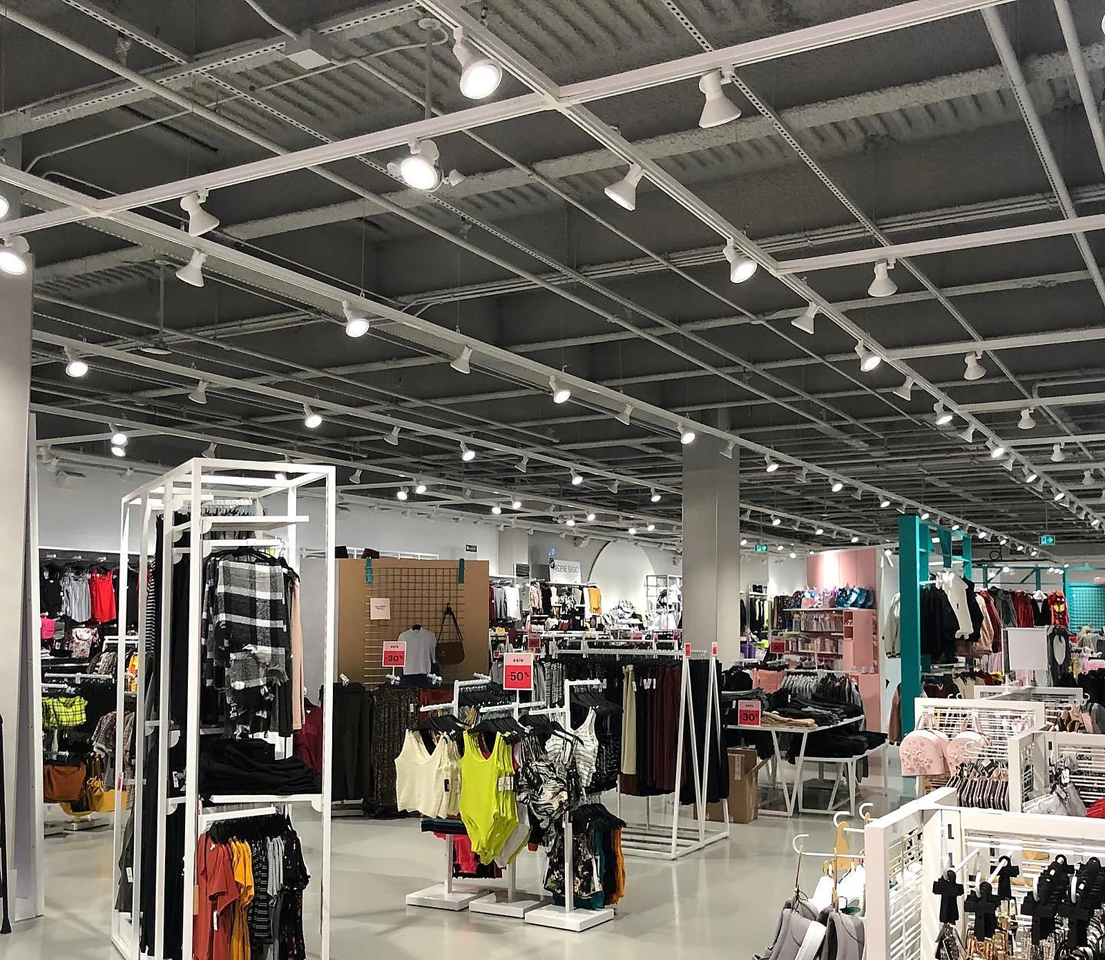 Ardene sales floor with black open ceiling