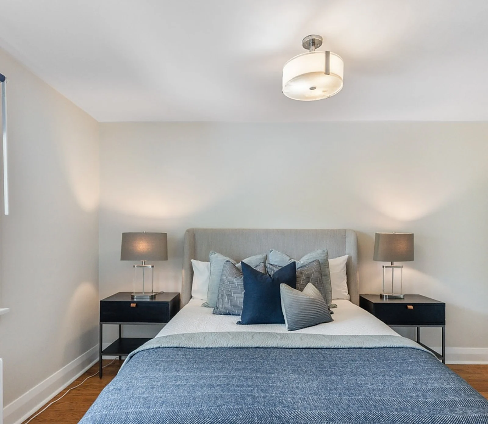 East York bedroom, white walls, blue bedding