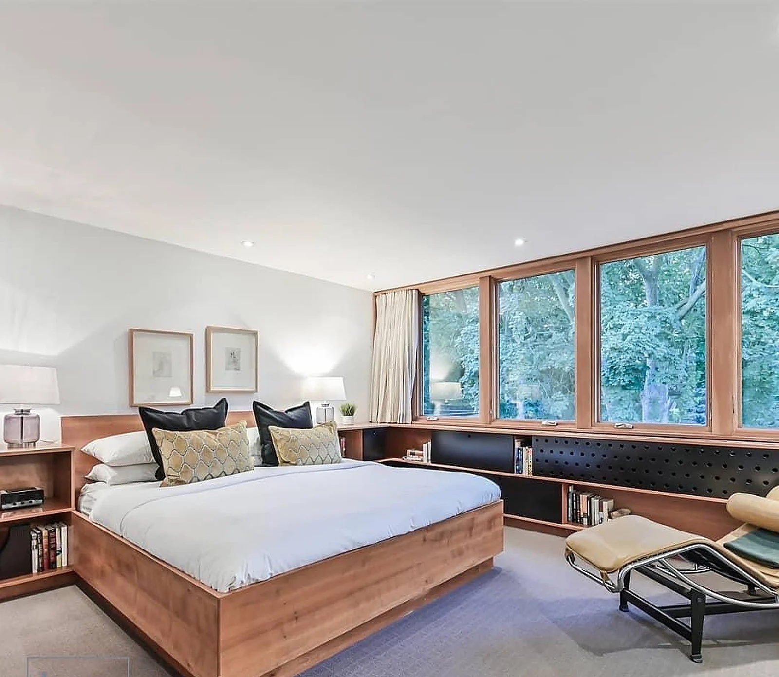 Summerhill bedroom with wood window bench, light grey walls