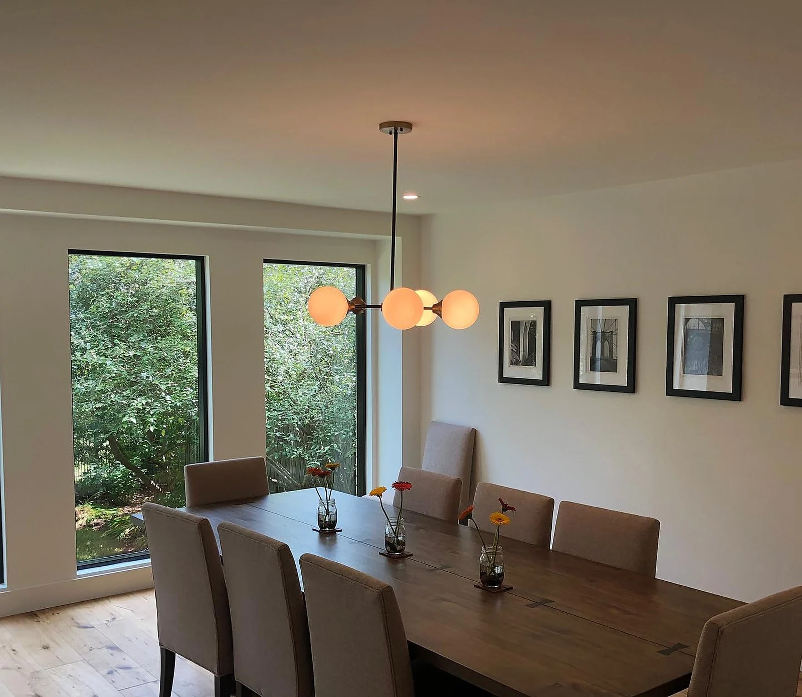 Dining room, white walls, dark trim windows