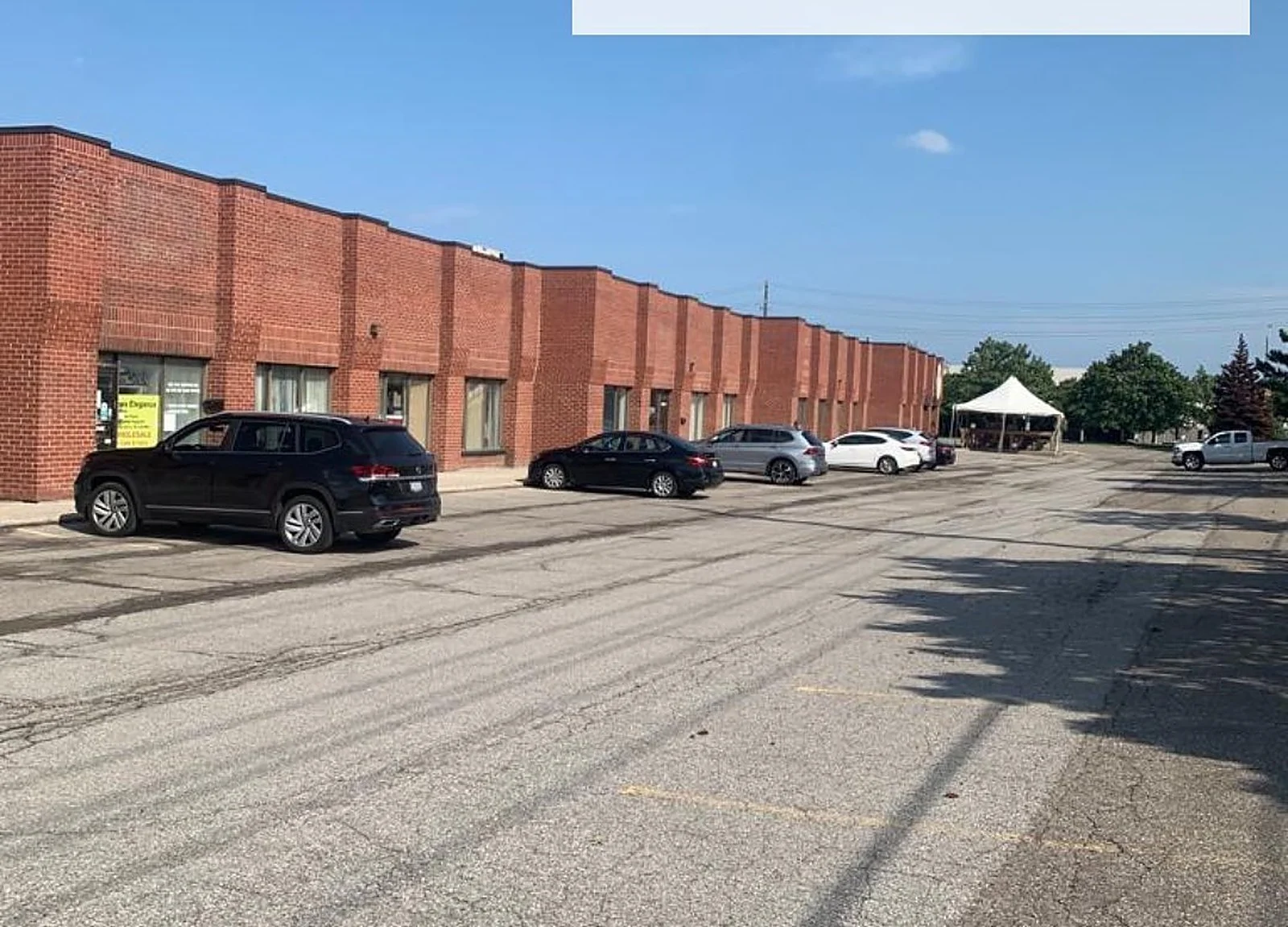 BEFORE: red-brick industrial row