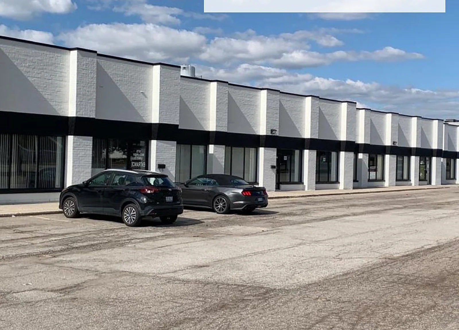AFTER: industrial row painted white, black accents