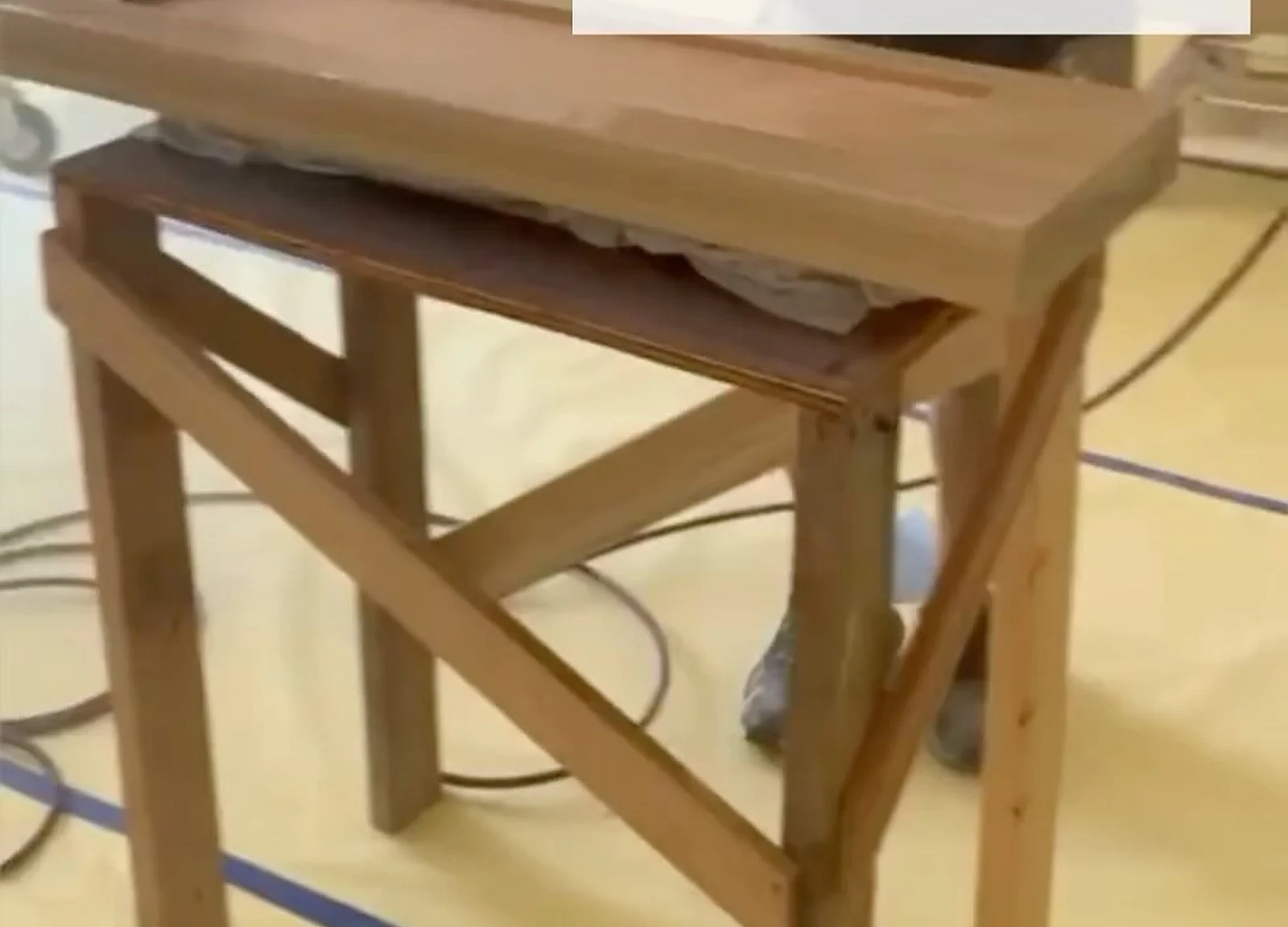 DURING: stair tread on sawhorse being finished