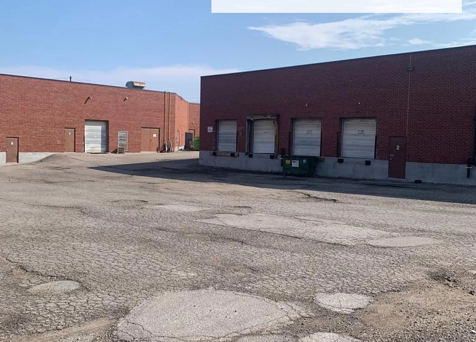 BEFORE: brick loading docks