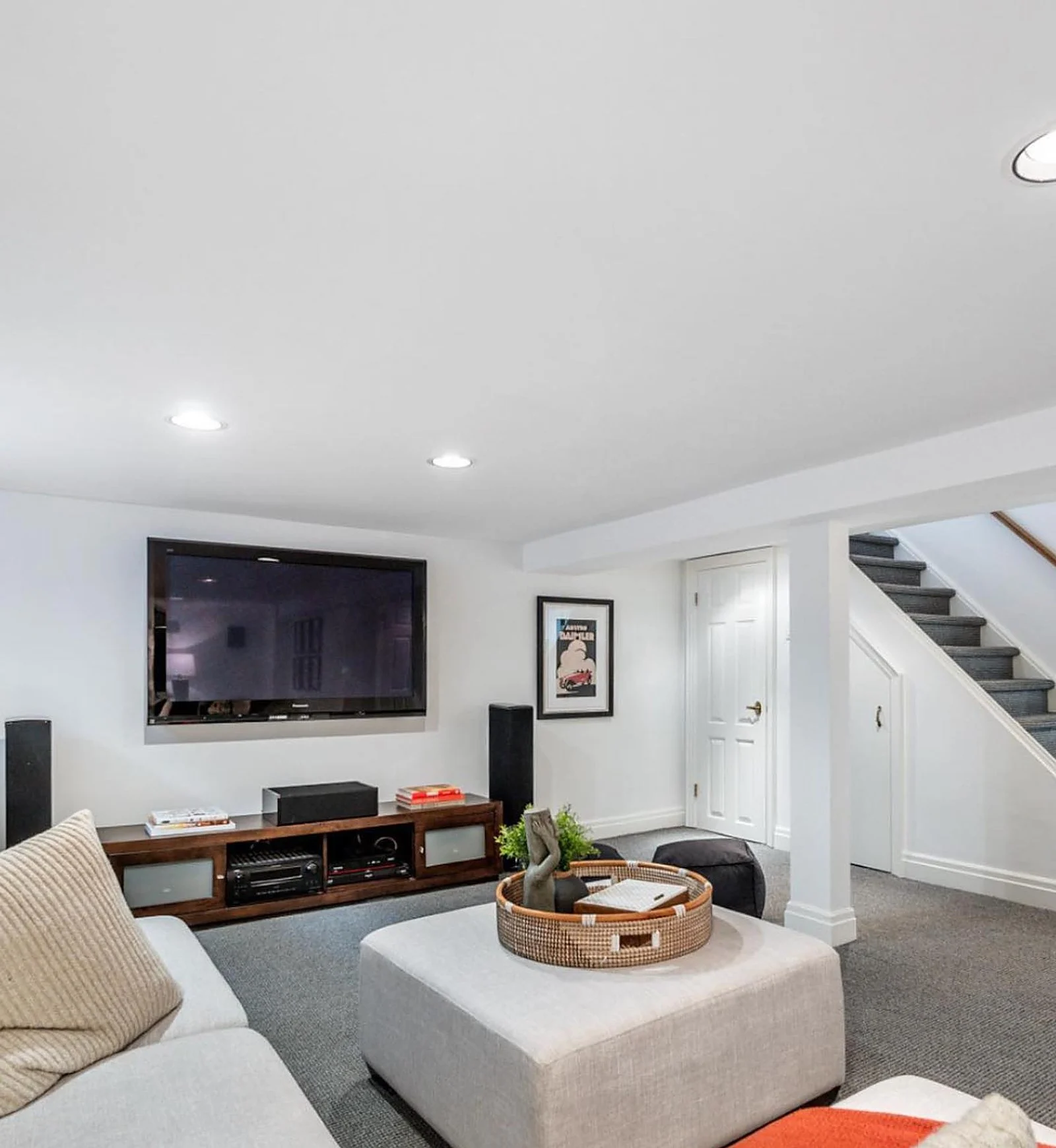 Basement family room, white walls