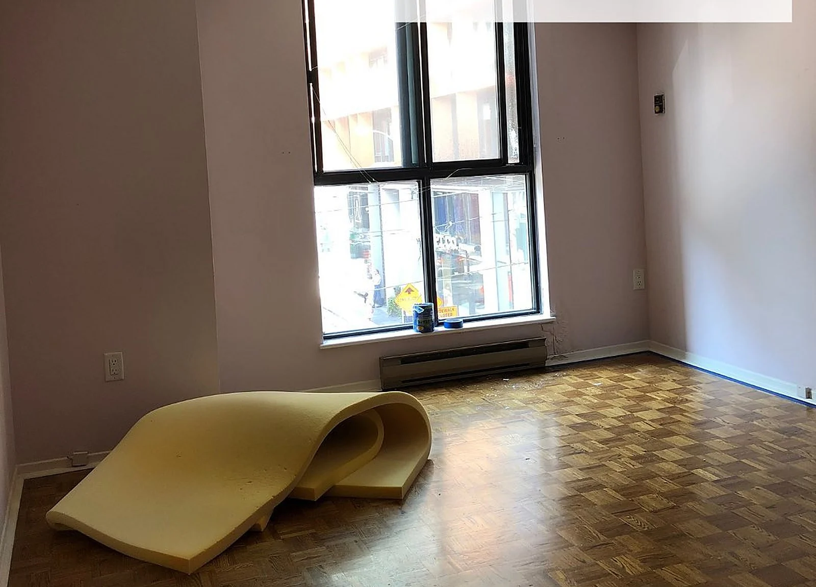 BEFORE: empty bedroom with window, mauve walls