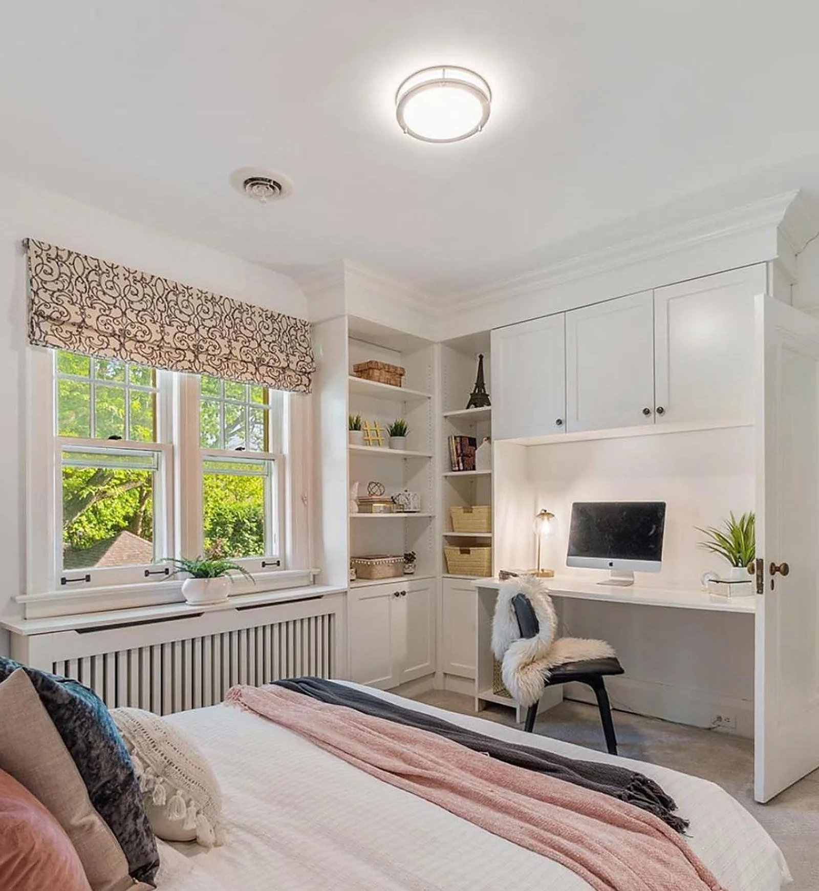 Bedroom with built-in desk