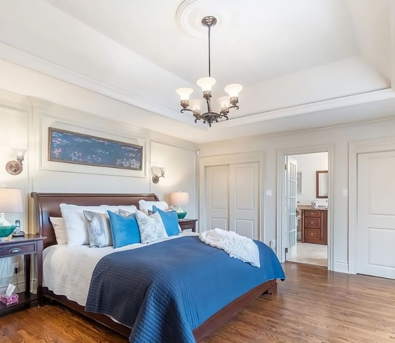 Master bedroom, white tray ceiling, blue bedding