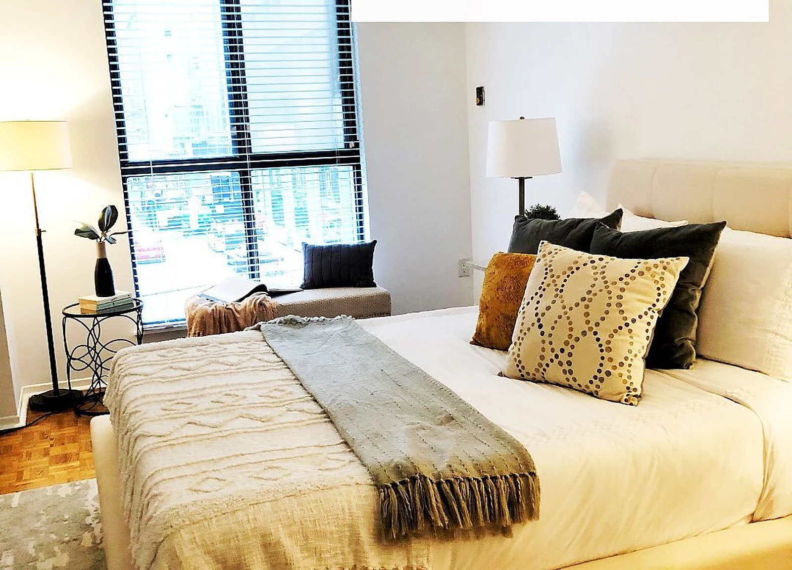 AFTER: staged bedroom, white walls