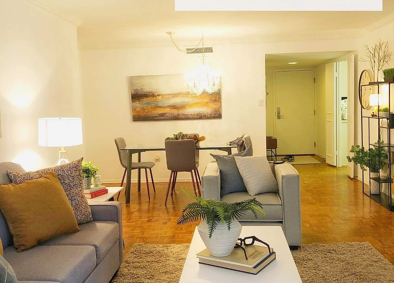 AFTER: condo living/dining room, white walls, staged