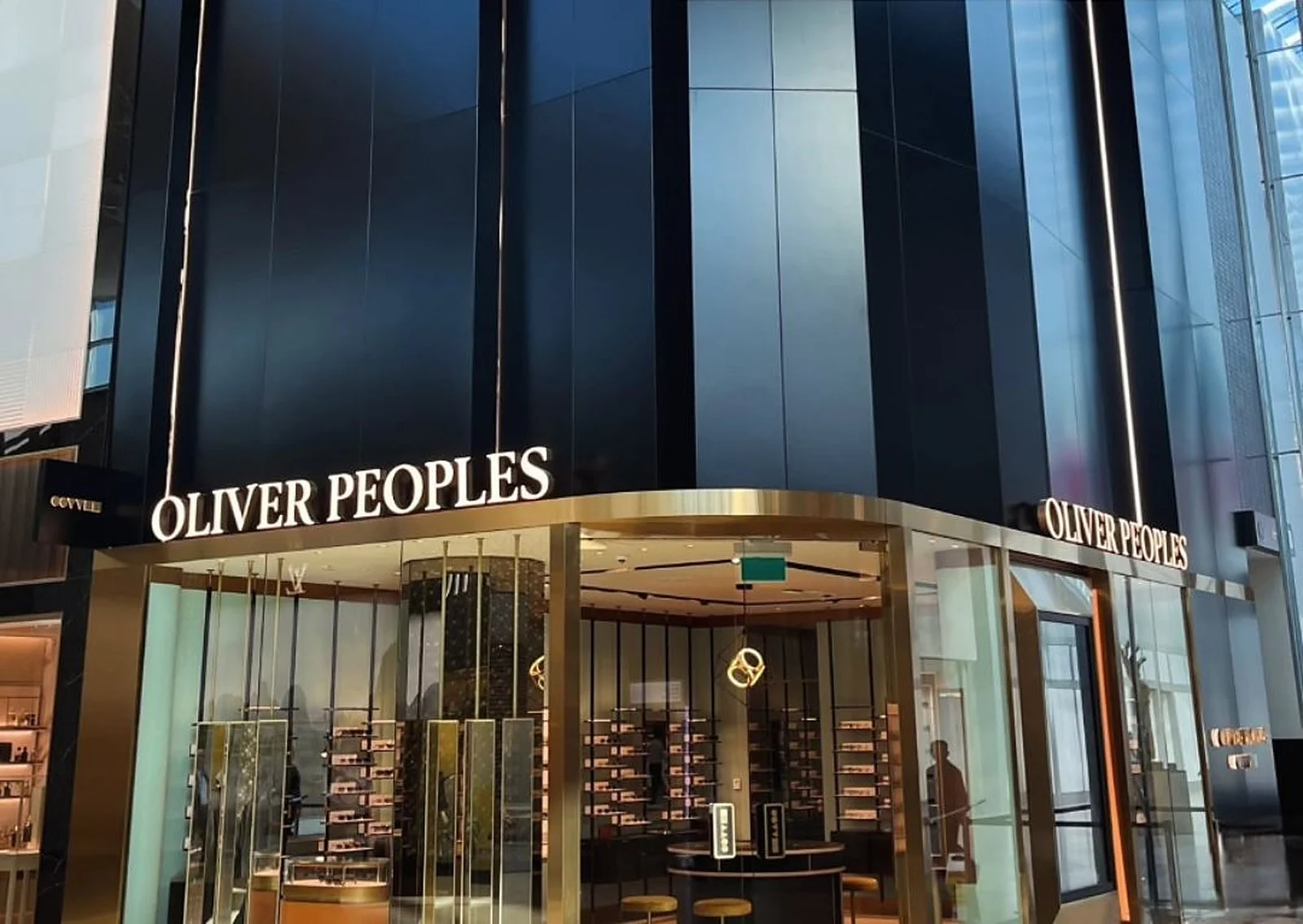 Oliver Peoples storefront with black exterior panels