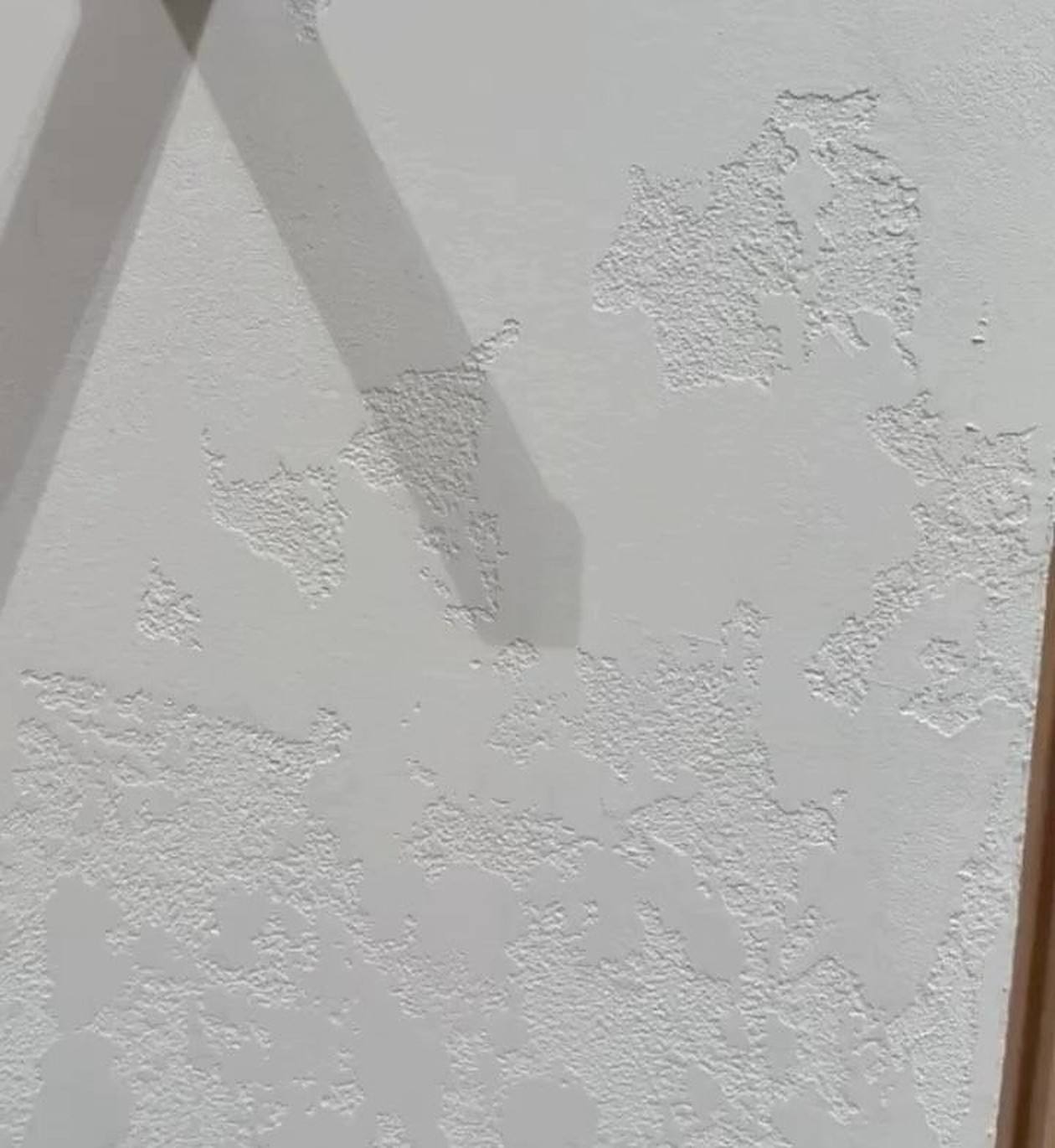 Close-up of a hand-applied stone-look paint finish